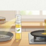 Side-by-side view of a cooking oil spray and a traditional oil bottle being used on a pan in an Indian kitchen, showing controlled oil application for everyday cooking.