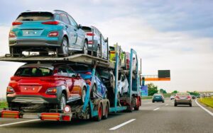 cars-carrier-truck-road-highway-poland-lorry-transporter-logistics-work-trailer-with-cargo-car-drive-delivery-transport-export-industry-heavy-hauler-haul-vehicle-auto-haulage_250132-1431 (1)