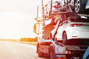 new-cars-hydraulic-trailer-ready-delivery-sale-car-transporter-truck-carries-many-cars-twolevel-modular-ramp-fast-efficient-shipping-service-car-industry-customers_782515-12290