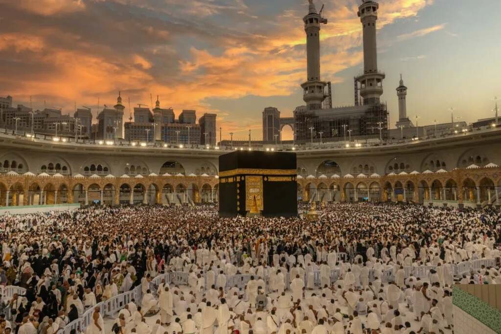 Holy Kaaba surrounded by Muslim pilgrims at Masjid al-Haram in Makkah, Saudi Arabia.