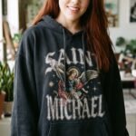 Woman_smiling_in_vintage_hoodie_2K_20261008153517